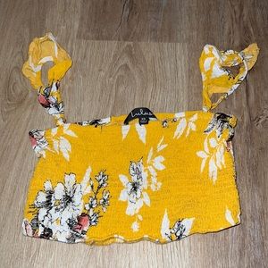 Yellow floral crop tank lupus
